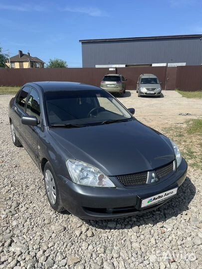 Mitsubishi Lancer 1.6 МТ, 2005, 231 000 км