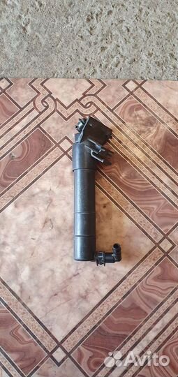 Форсунка омывателя фар