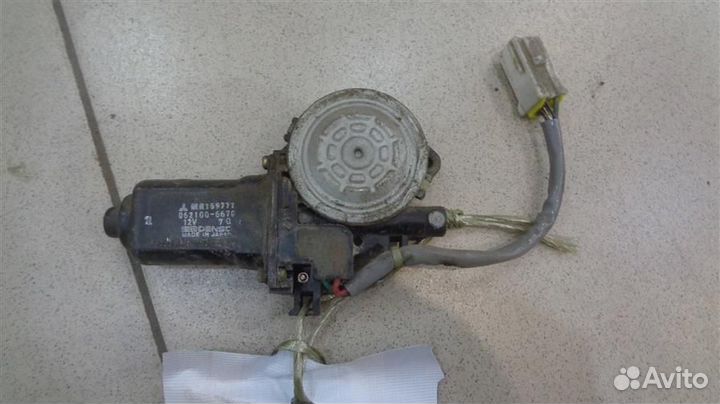 Моторчик стеклоподъемника задний левый Mitsubishi