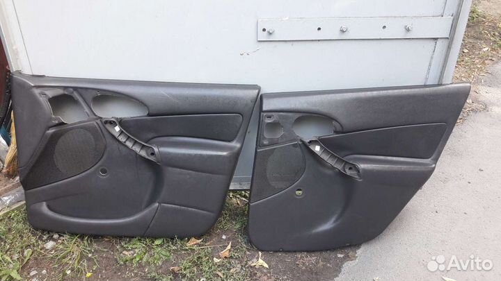 Обшивка двери форд фокус 1