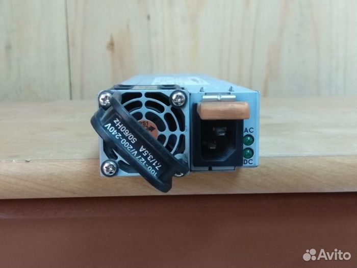 Блок питания IBM 670W (Artesyn) 7001134-Y000 для