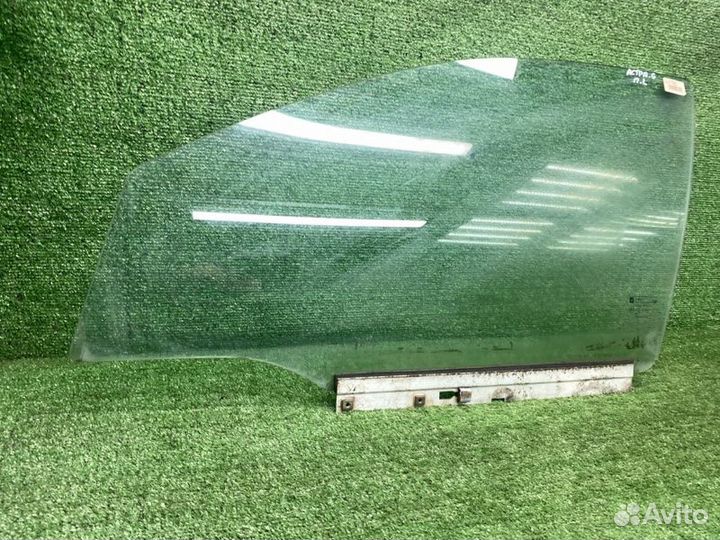 Стекло двери переднее левое Opel Astra G