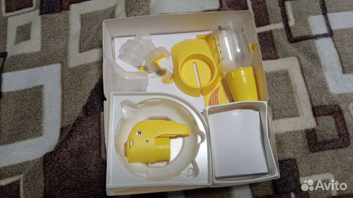 Молокоотсос medela mini electric