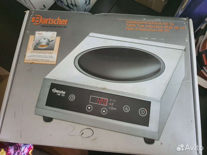 Индукционная плита Вок