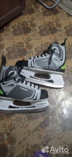 Роликовые коньки