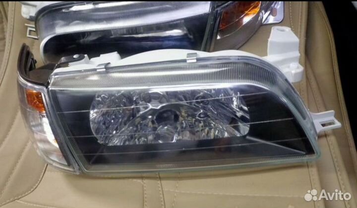 Фары toyota corolla ae100