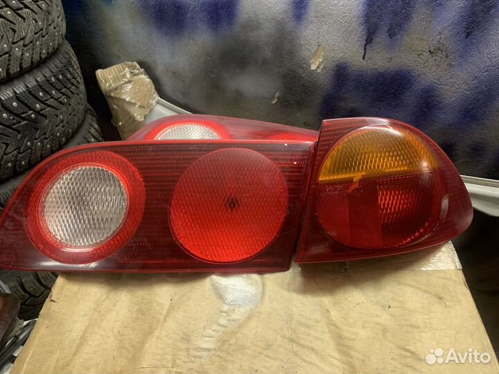 Фонари задние тойота калдина 210