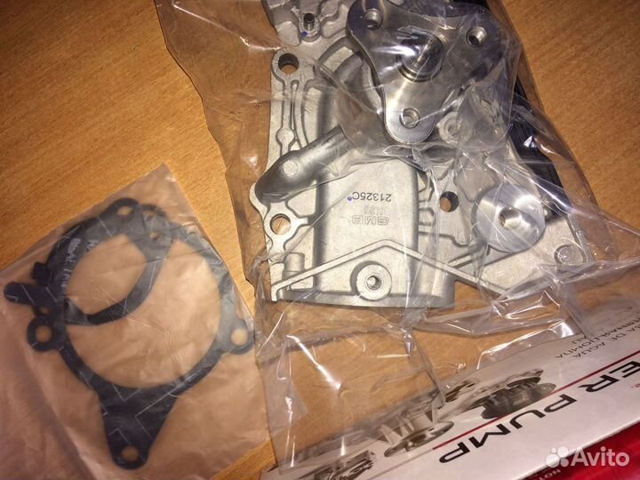 Помпа водяная Киа Спектра / Рио 1