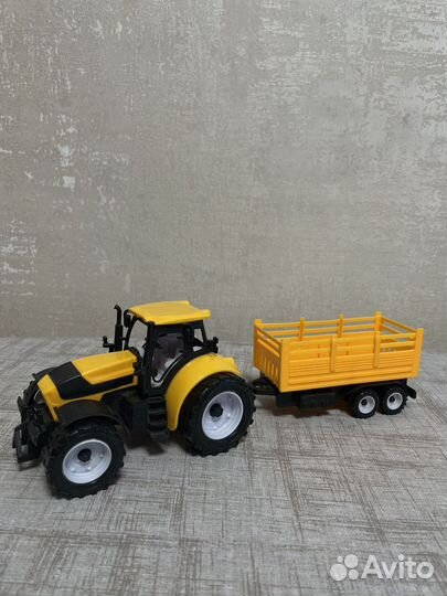 Игрушка трактор