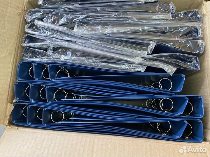 Папки скорошиватель Комус на 2х и 4х кольцах