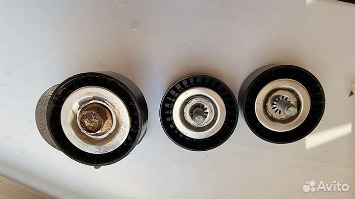 Опорные ролики/натяжитель ремня лансер 10