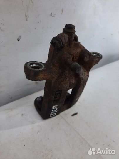 Суппорт тормозной задний левый Nissan X-Trail