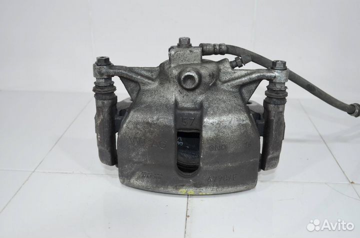 Суппорт тормозной передний левый Audi A3 8V 2012+