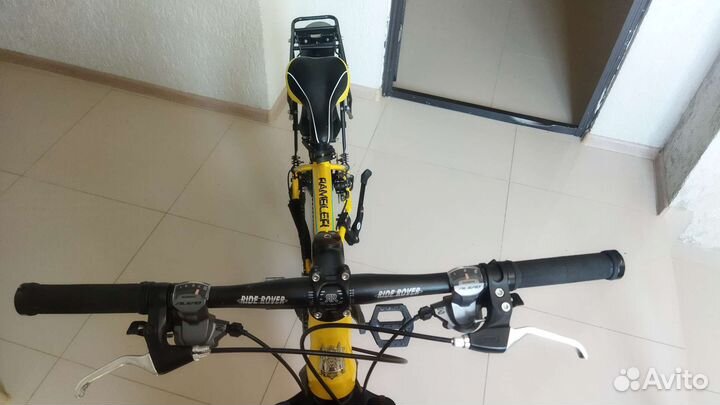 Классный горный велосипед с велорюкзаком