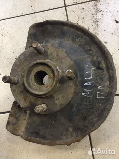 Поворотный кулак передний левый Mitsubishi Lancer