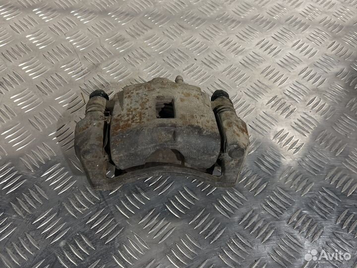 Суппорт передний левый kia spectra