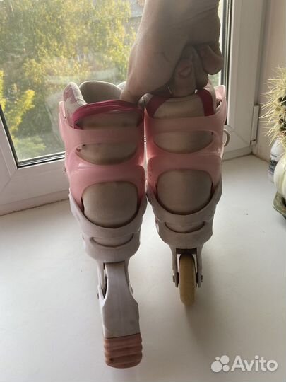 Роликовые коньки