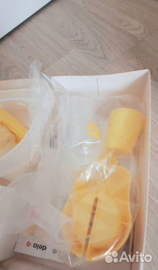 Электрический молокоотсос medela