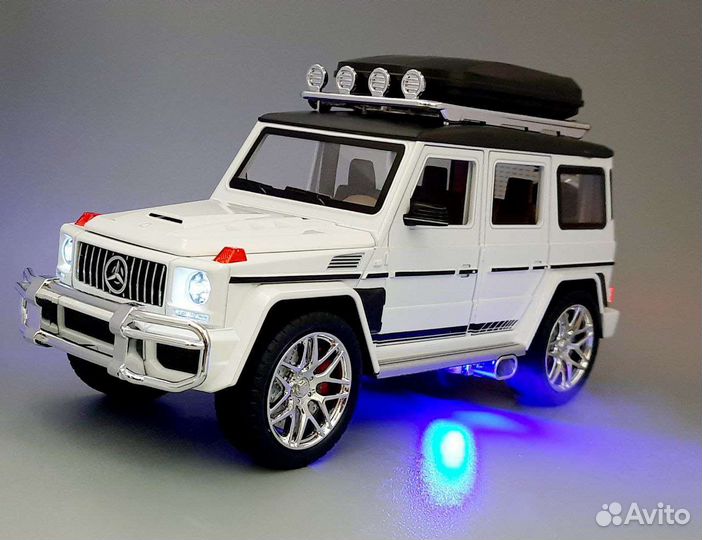 Мерседес G Гелик с выхлопом и багажником на крыше
