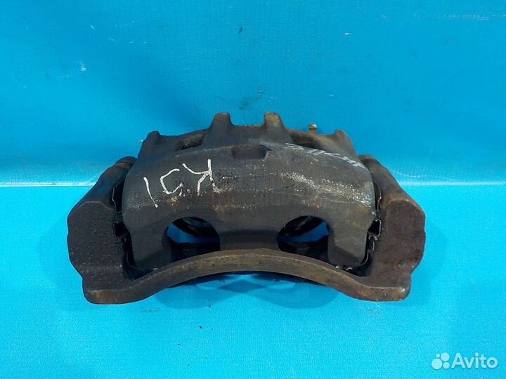 Тормозной суппорт передний левый KIA Sorento 1 200