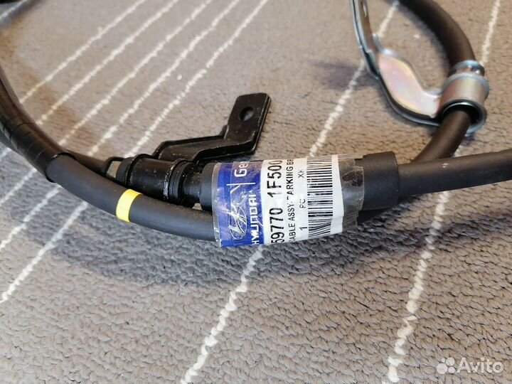 Трос стояночного тормоза hyundai/KIA 597701F500