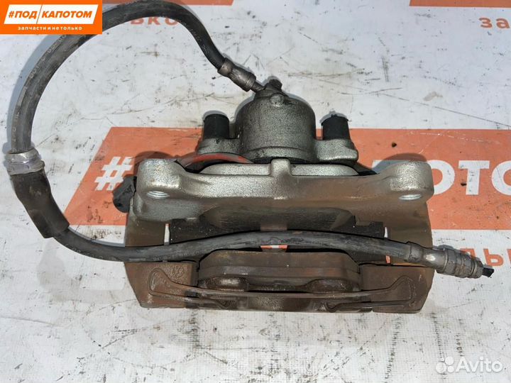 Суппорт тормозной передний левый Volkswagen Passat