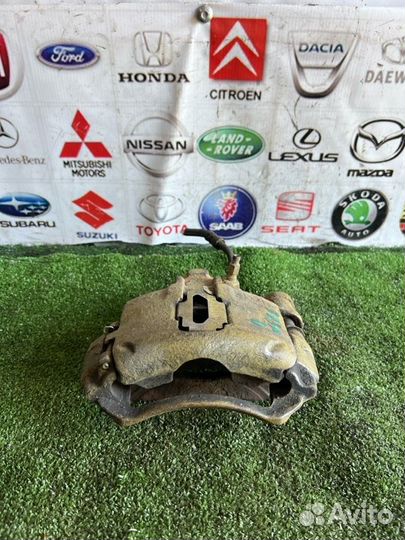 Суппорт тормозной передний левый Ford Escort 5