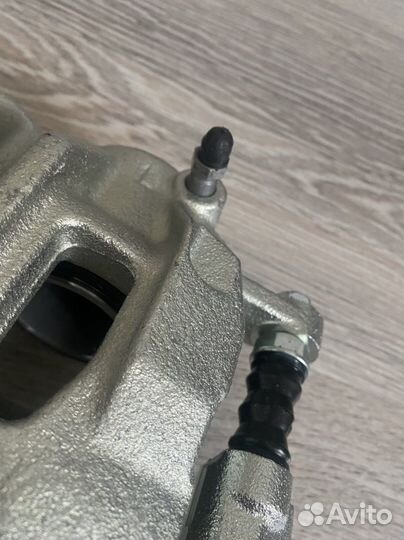 Суппорт тормозной передний газ next