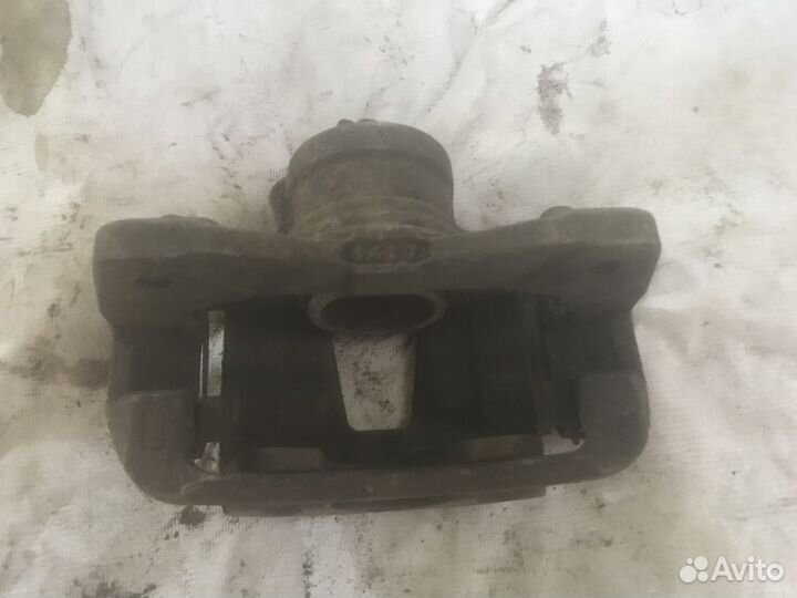 Суппорт тормозной передний левый Chevrolet Lacetti