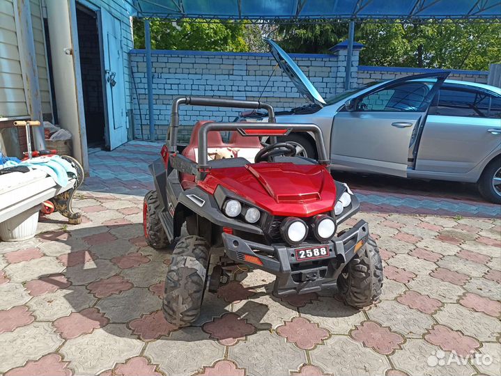 Детский электромобиль двухместный