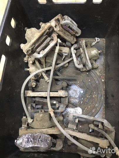 Суппорт тормозной передний Nissan Juke