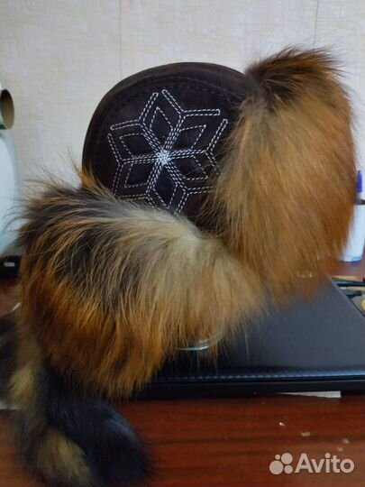 Женские меховые шапки