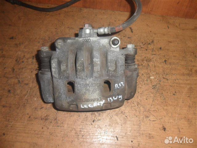 Тормозной суппорт передний правый Subaru Legacy