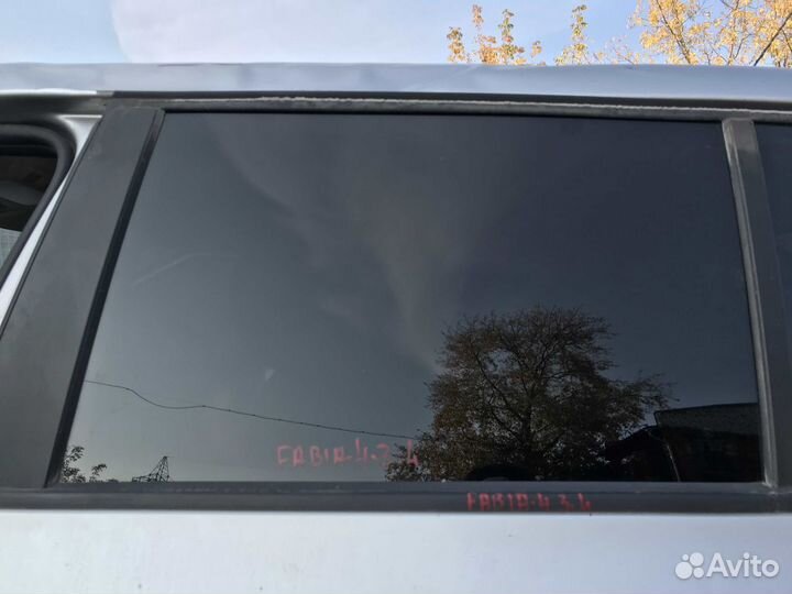Стекло заднее левое Skoda Fabia
