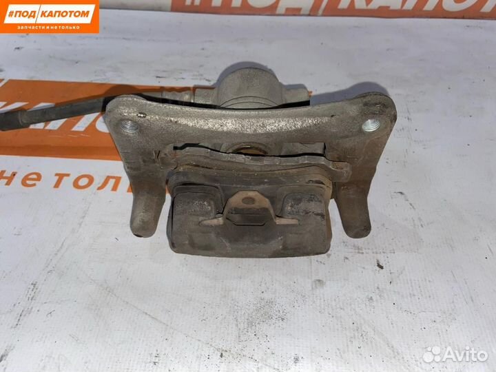 Суппорт тормозной задний правый Mitsubishi Lancer