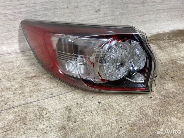 Фонарь левый Mazda 3 BL 2010