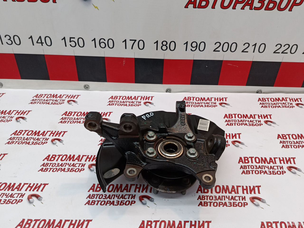 Кулак поворотный правый Джили Атлас Про