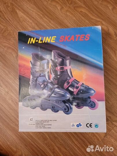 Роликовые коньки