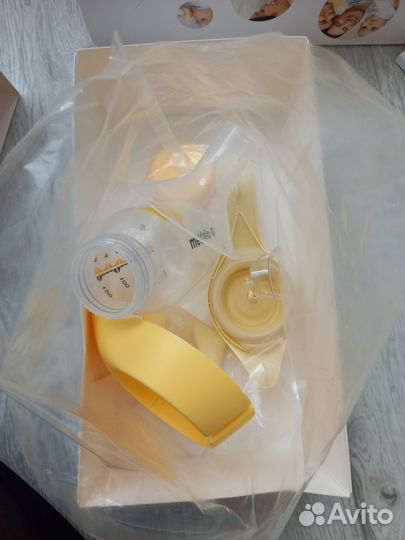 Абсолютно новый молокоотсос