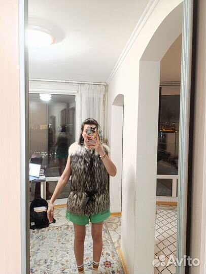 Жилетка меховая женская