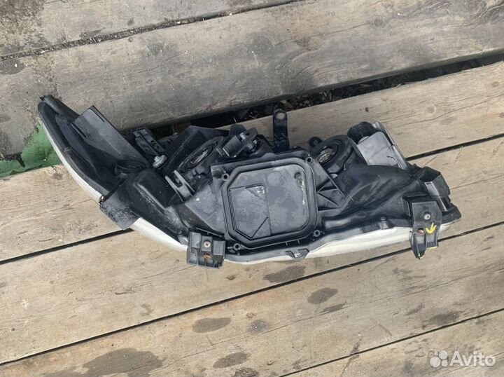 Фара левая Toyota Corolla E15