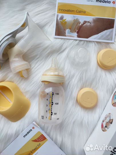 Молокоотсос medela ручной с соской