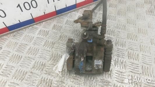 Суппорт тормозной задний левый nissan almera N16