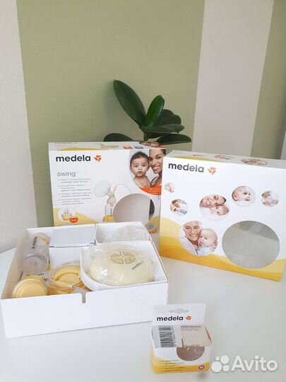 Молокоотсос medela swing электрический