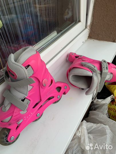 Роликовые коньки