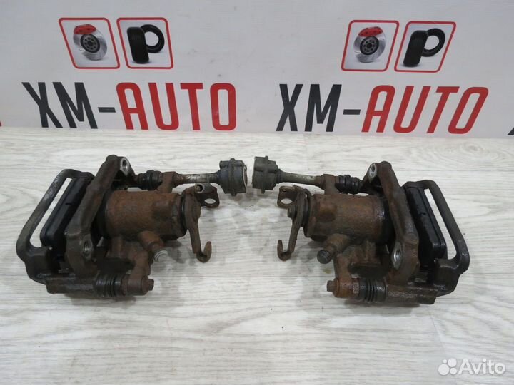 Суппорт задний правый Opel Astra J