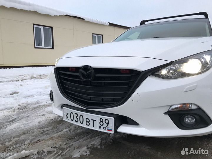 Подиум, центральный для гос. номера. Mazda 3 bm