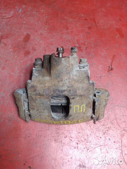 Суппорт передний правый Kia Sportage 1