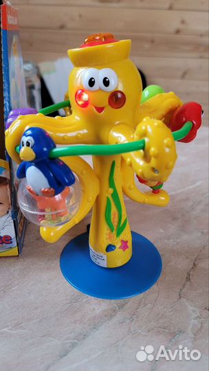 Игрушка осьминог на присоске