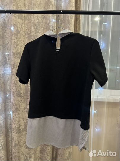 Блузка без рукавов